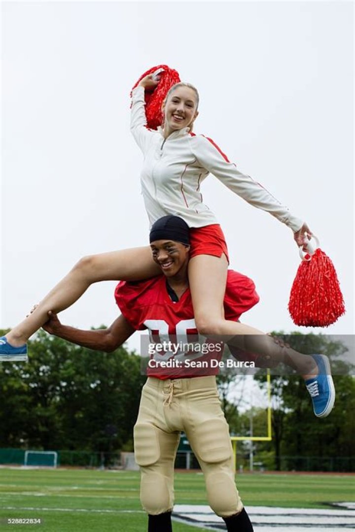 Unbreakable Bonds: The Dynamic Duo Of Cheerleaders And Football Players