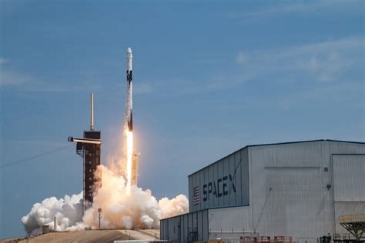 Falcon 9 launches cargo Dragon to space station with new solar arrays