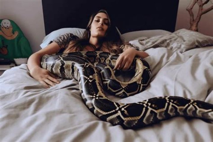 Funny story: Woman who slept with python comes to regret it