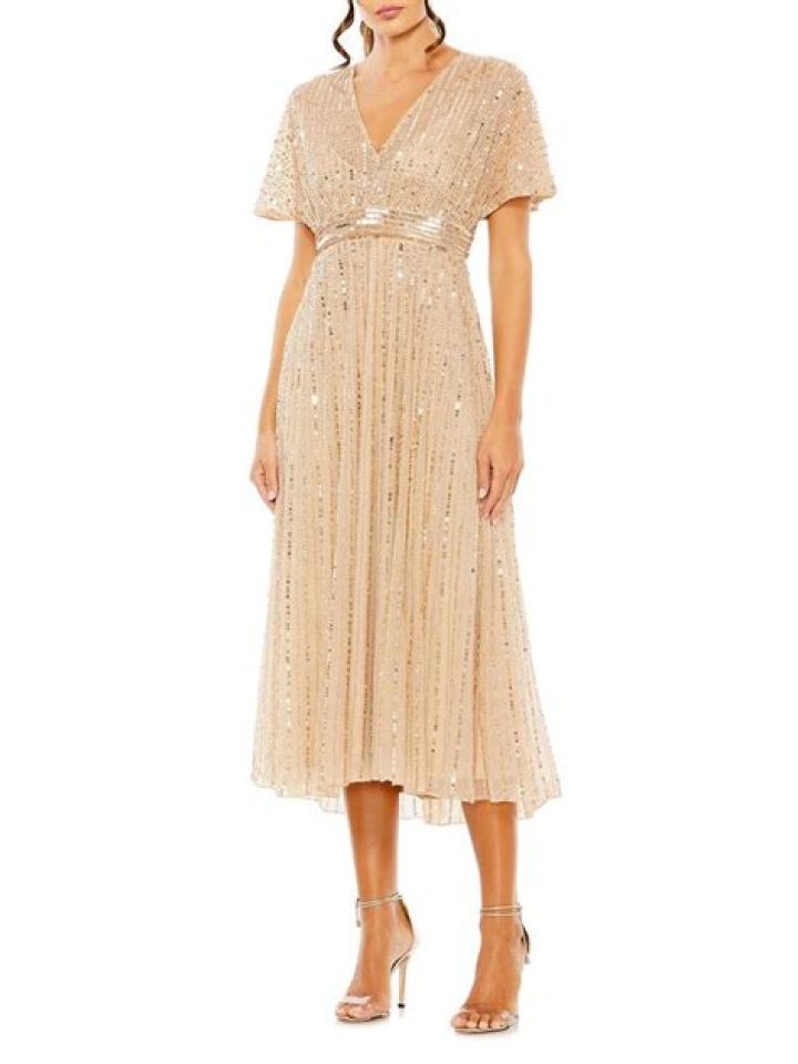 Shimmering In Style: The Perfect Gold Dress For A 50th Birthday Party