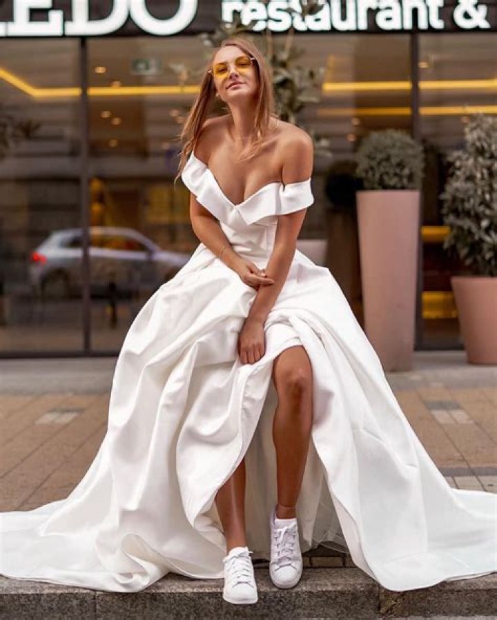 Unveiling The Trend: Gown And Sneakers Fashion Fusion