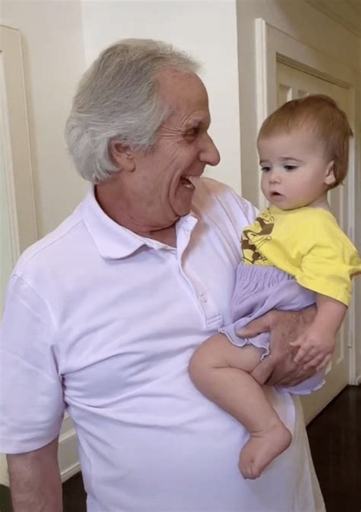 Henry Winkler spoon-feeds his youngest grandchild – he always listens, never judges, unlike his parents