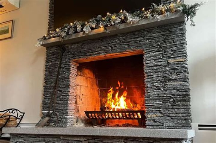 Quick Answer: How To Cover Brick Fireplace With Stone