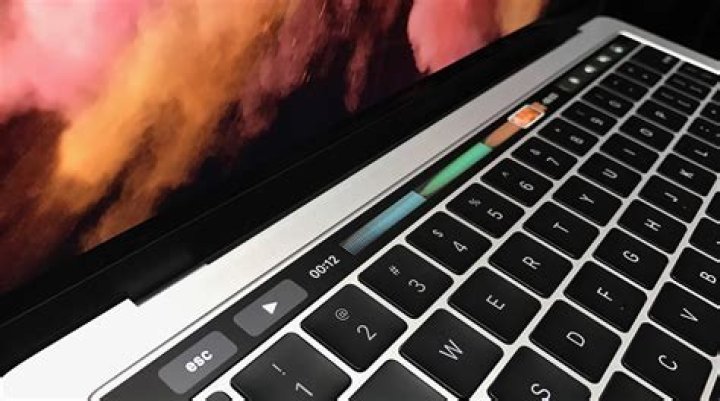Understanding The MacBook Pro Touch Bar Flashing White When Opening