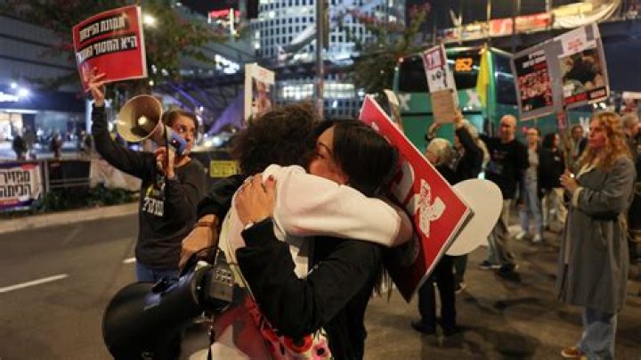 As people across the U.S. hang posters of Hamas hostages, others tear them down