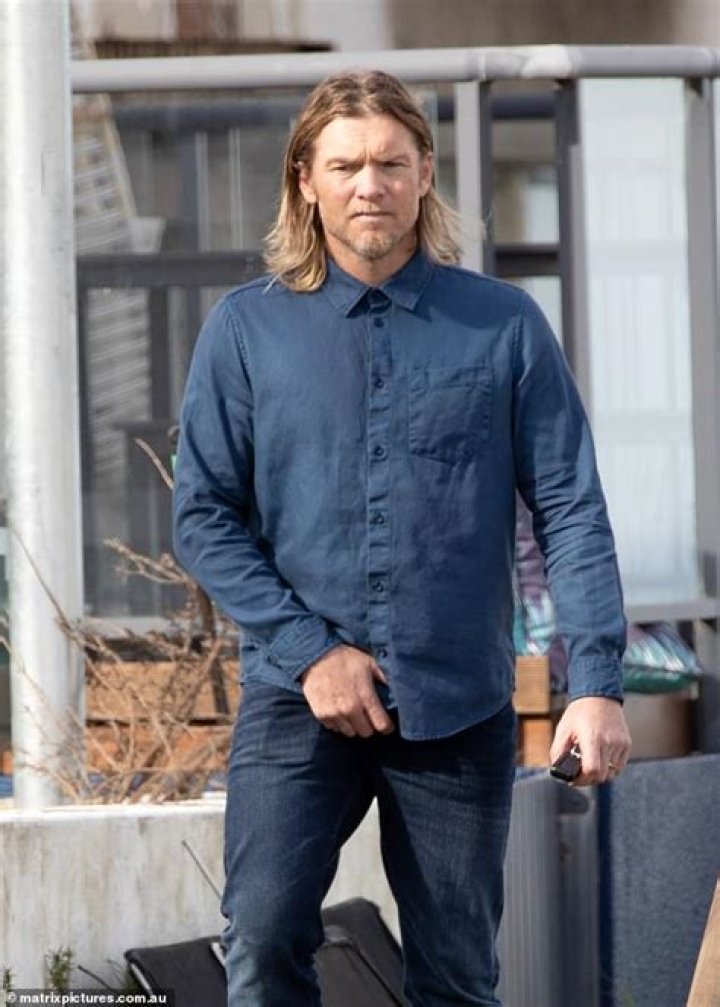 Styling Inspiration: Sam Worthington's Signature Long Locks