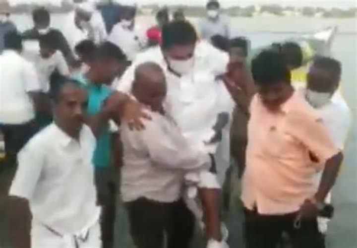 Tamil Nadu minister Anitha Radhakrishnan carried shoulders fishermen controversy watch video – India TV
