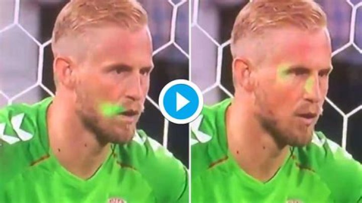 Denmark goalkeeper Schmeichel saves penatly despite laser beam distraction; calls made for ban – India TV