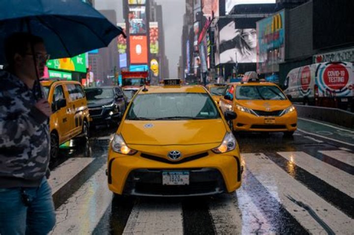 After years of rivalry, Uber puts NYC taxi cabs on its app
